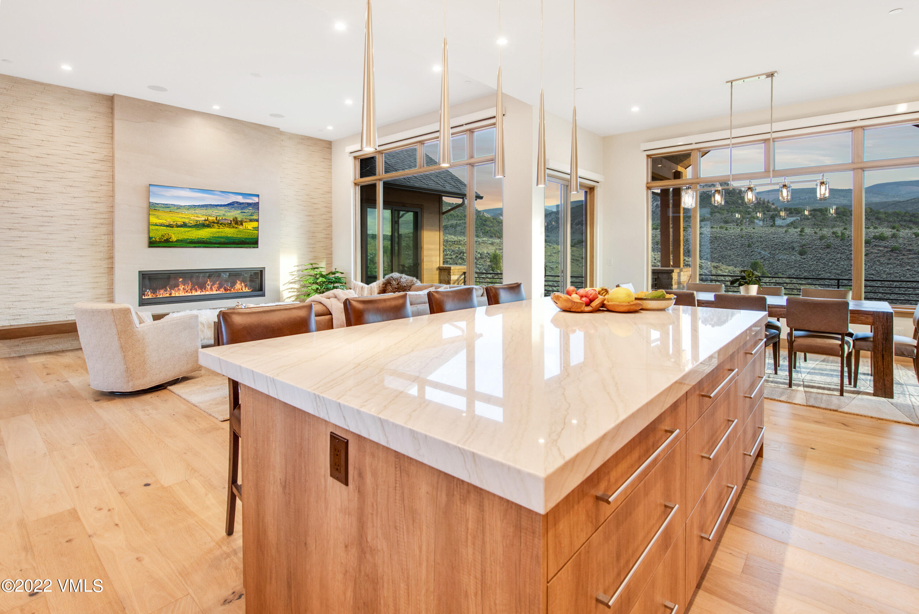 2185 East Haystacker Drive Eagle, CO 81631 - Photo 7 of 30 a large kitchen with kitchen island a large window in it