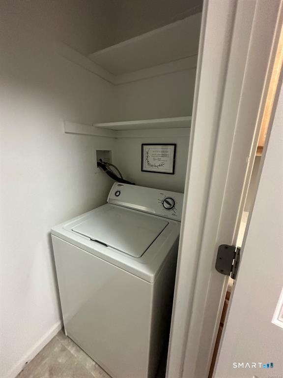 86 Buff Cap Road, Unit A4 Tolland, CT 06084 - Photo 11 of 21 In Unit Laundry off kitchen