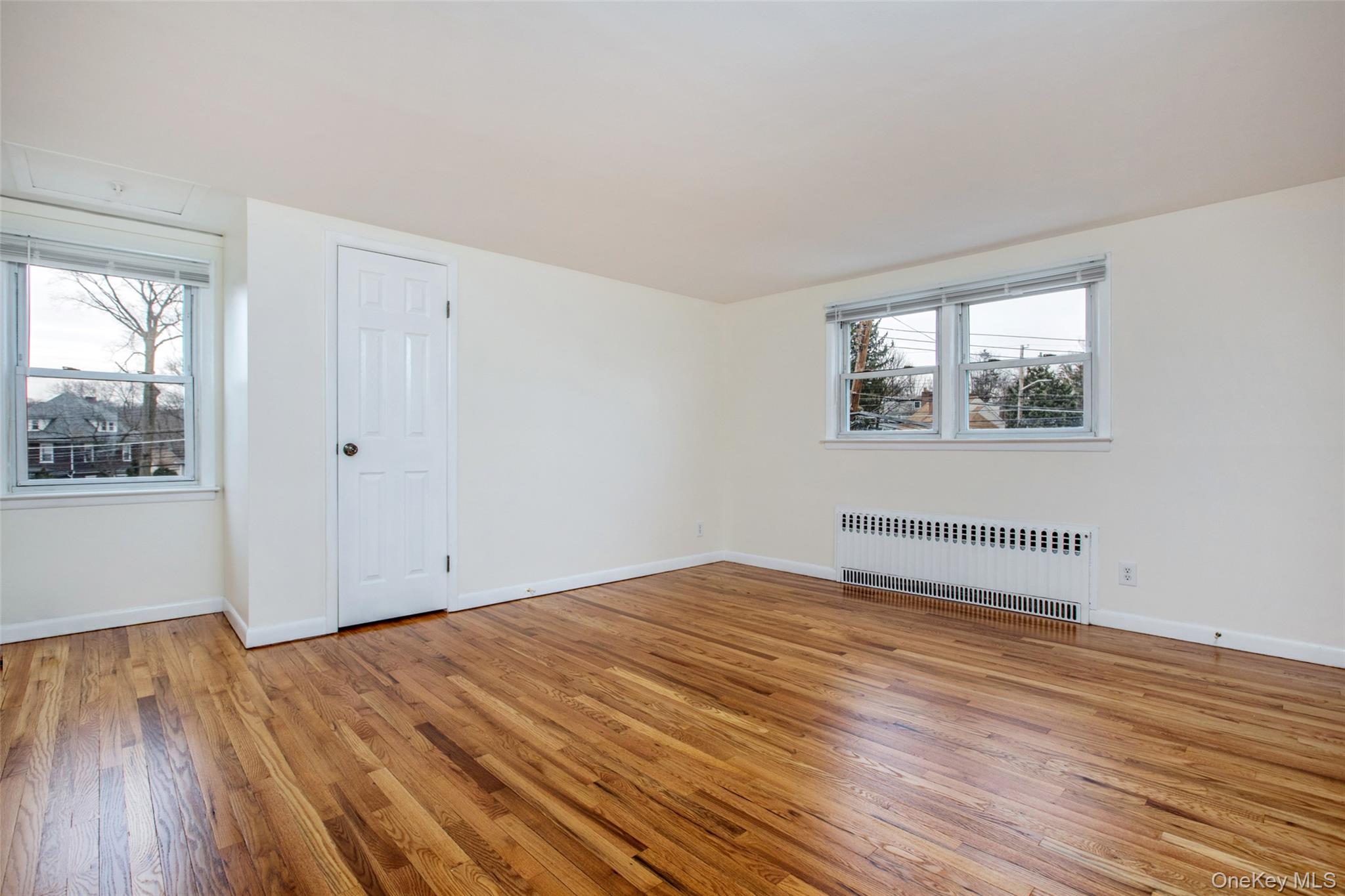 40 Division Street Rye Brook, NY 10573 - Photo 9 of 20 Another view of this spacious Primary Bedroom. Attic access for additoinal storage.