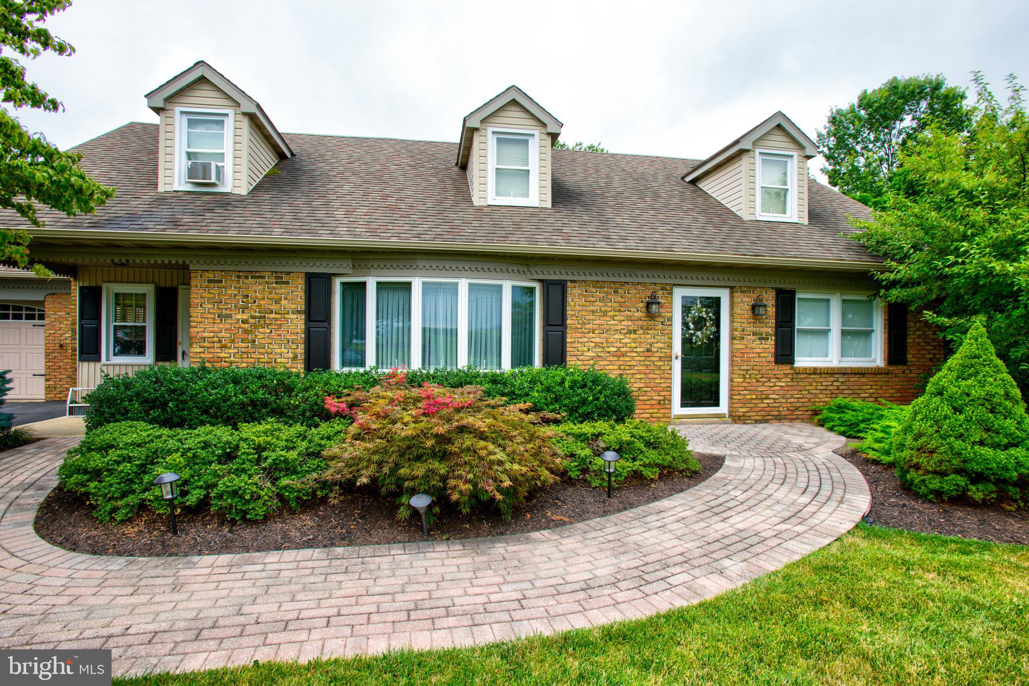 116 Meetinghouse Road Gap, PA 17527 - Photo 1 of 66 a front view of a house with garden