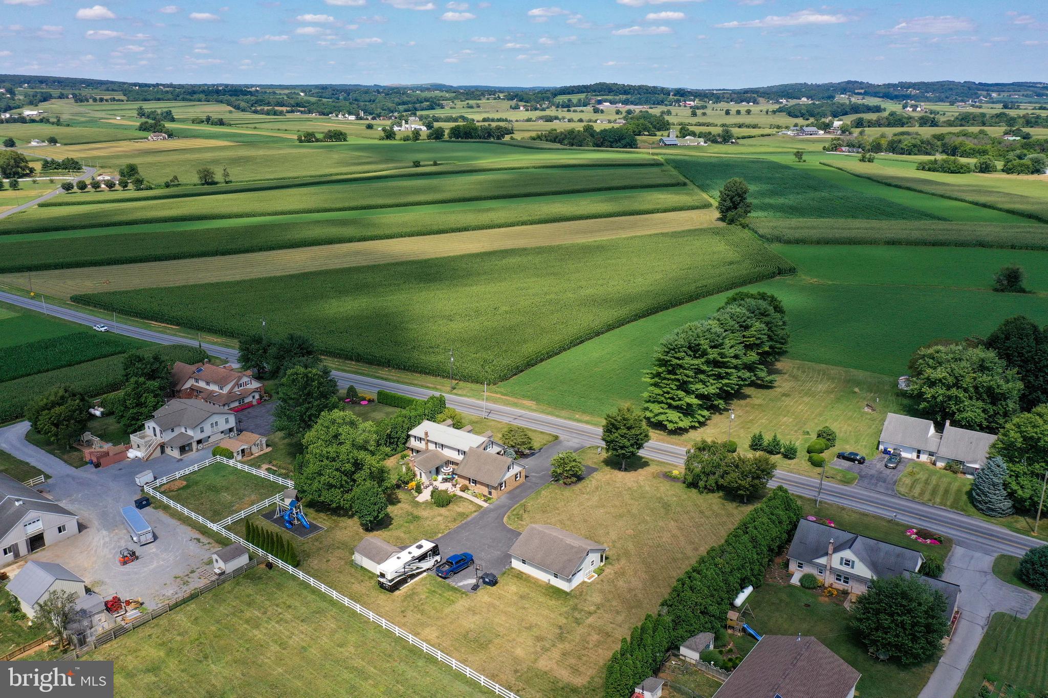116 Meetinghouse Road Gap, PA 17527 - Photo 12 of 66 an aerial view of a golf course with a garden