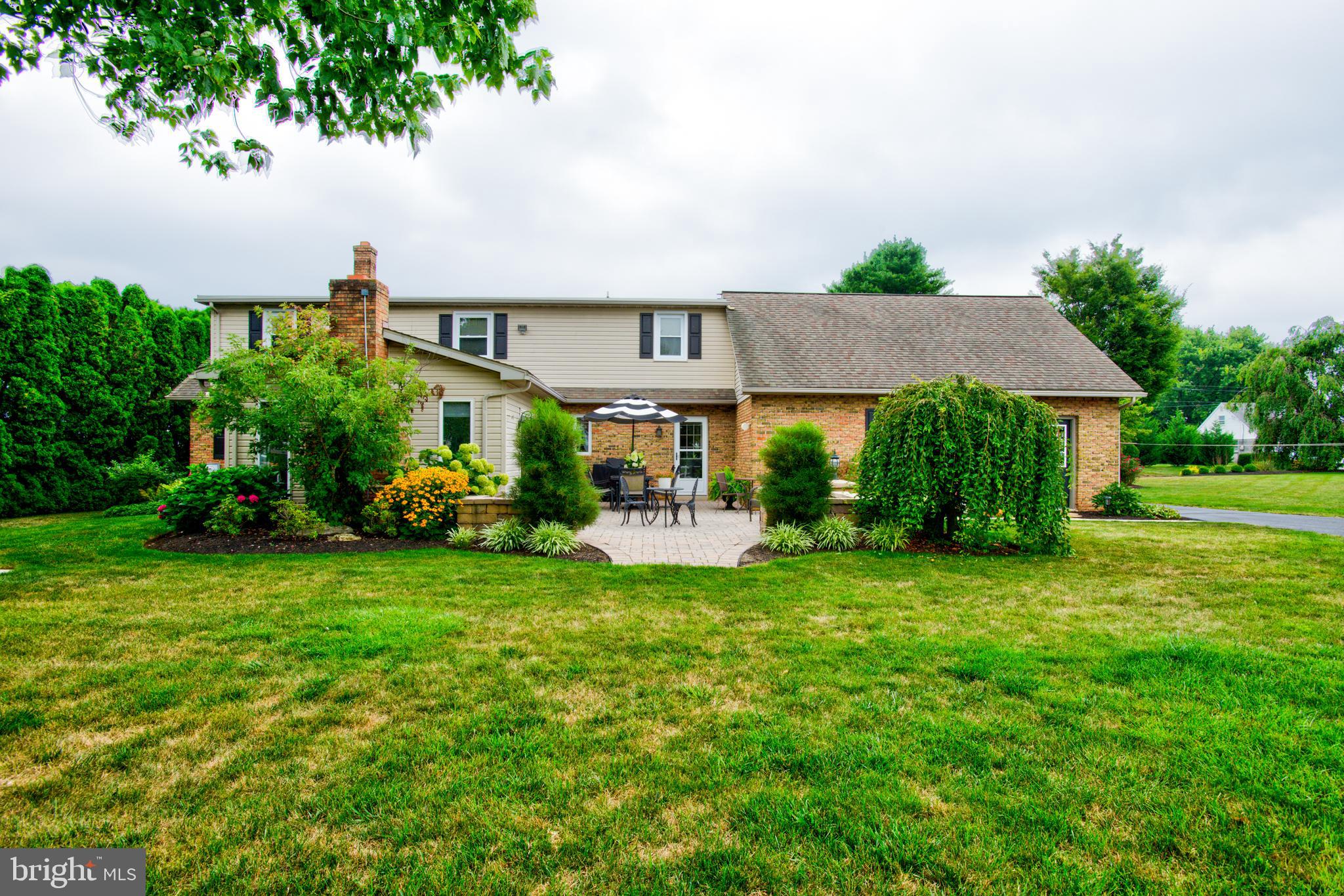 116 Meetinghouse Road Gap, PA 17527 - Photo 22 of 66 a front view of a house with garden