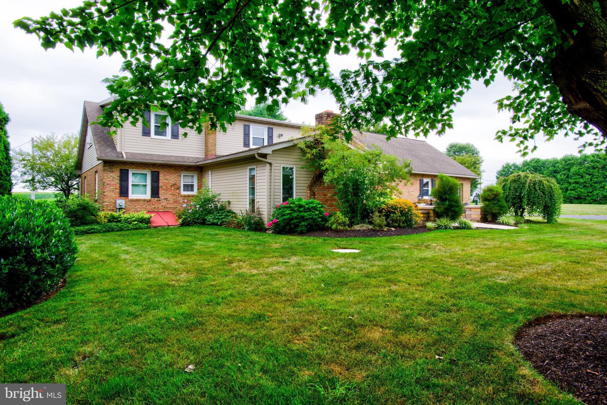 116 Meetinghouse Road Gap, PA 17527 - Photo 23 of 66 a front view of house with yard and green space