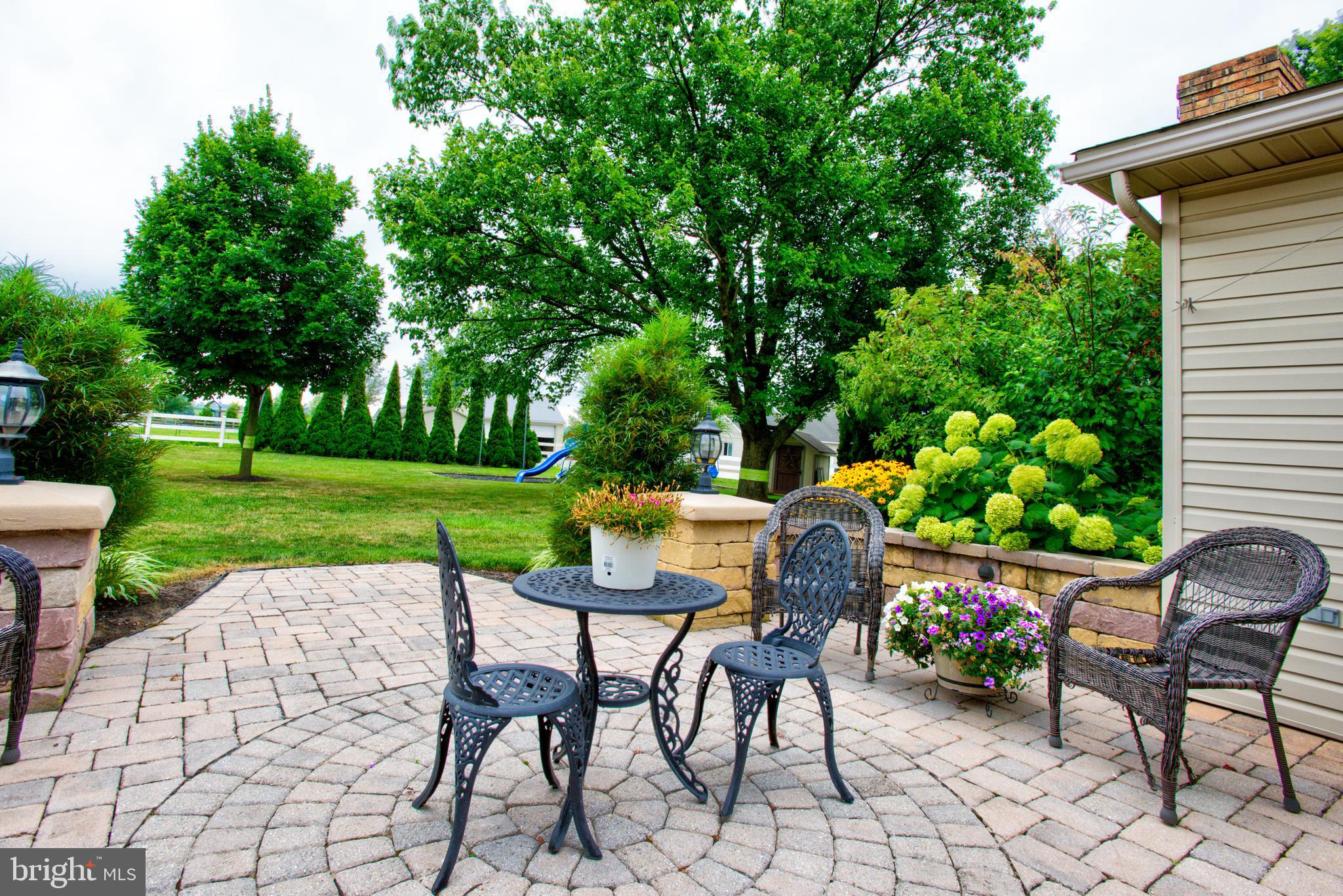 116 Meetinghouse Road Gap, PA 17527 - Photo 29 of 66 a view of a chairs and table in backyard of the house