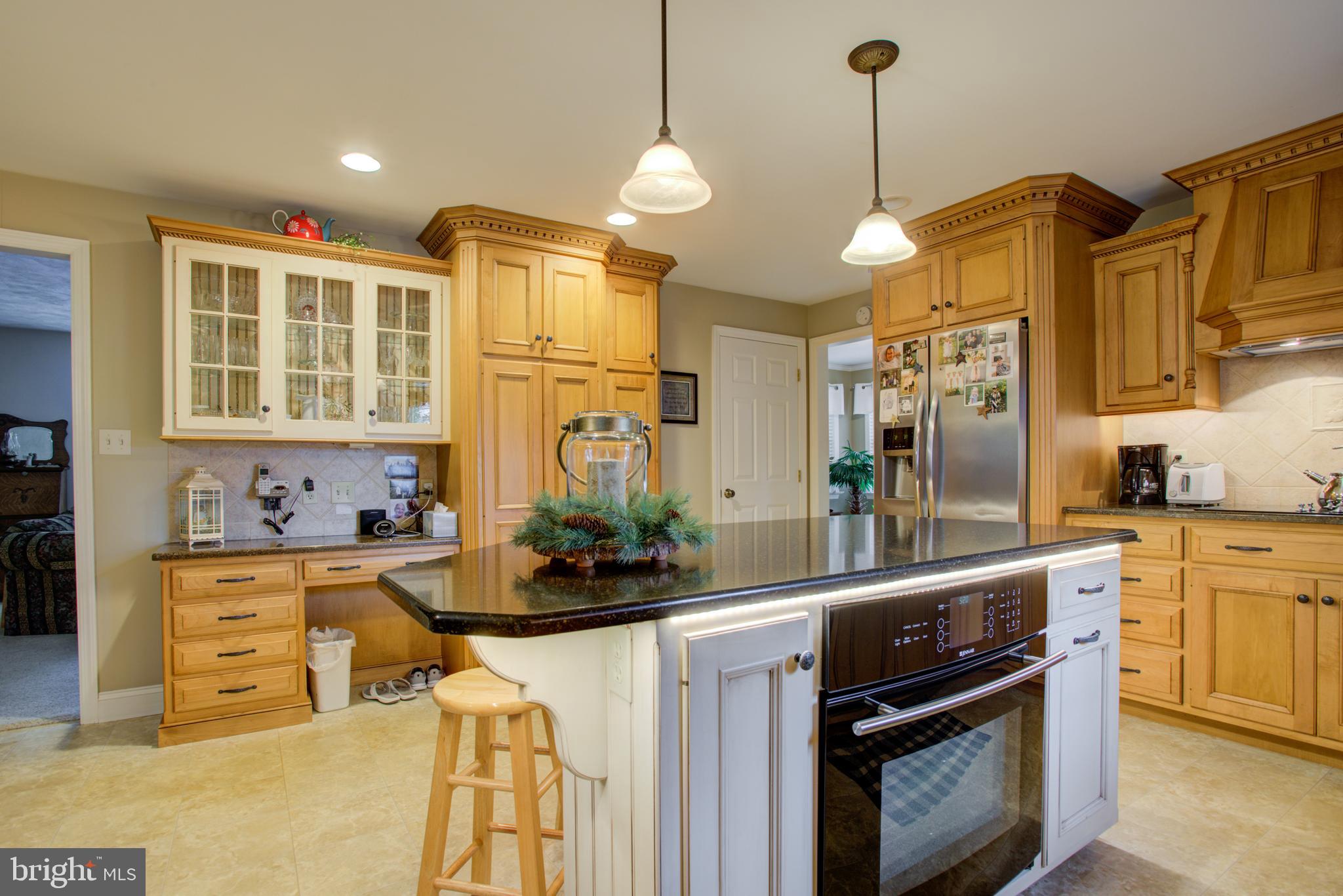 116 Meetinghouse Road Gap, PA 17527 - Photo 30 of 66 a kitchen with stainless steel appliances a sink a stove a refrigerator and cabinets