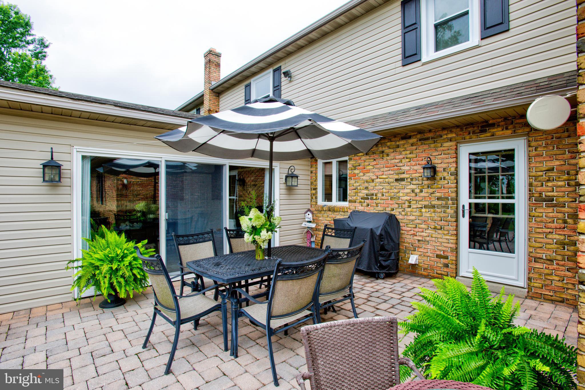 116 Meetinghouse Road Gap, PA 17527 - Photo 6 of 66 a view of a patio with table and chairs and potted plants