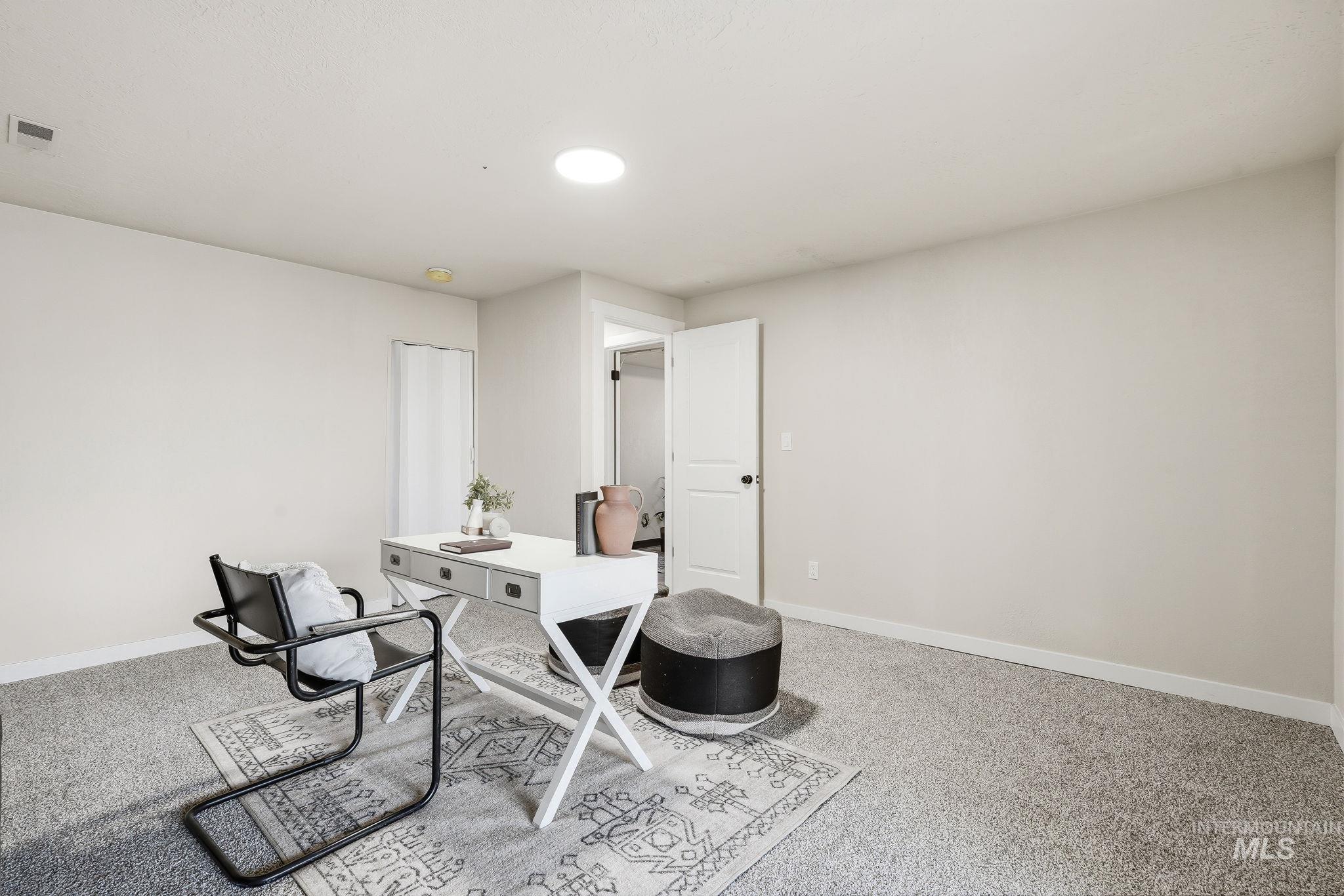 1990 Panama Street Boise, ID 83705 - Photo 30 of 50 Carpeted room with light neutral wall paint and white trim