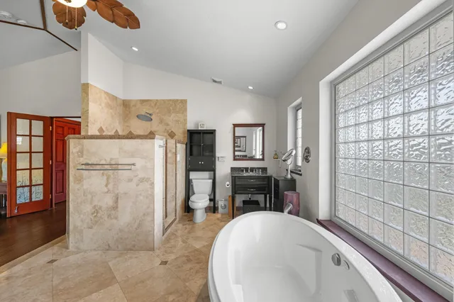 a view of a livingroom with furniture and wooden floor