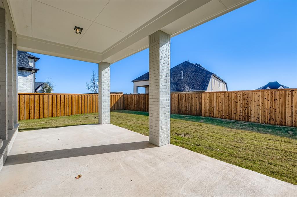 2651 Merrell Court Prosper, TX 75078 - Photo 26 of 28 a view of a backyard