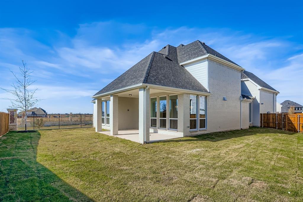 2651 Merrell Court Prosper, TX 75078 - Photo 27 of 28 a view of a house with a yard