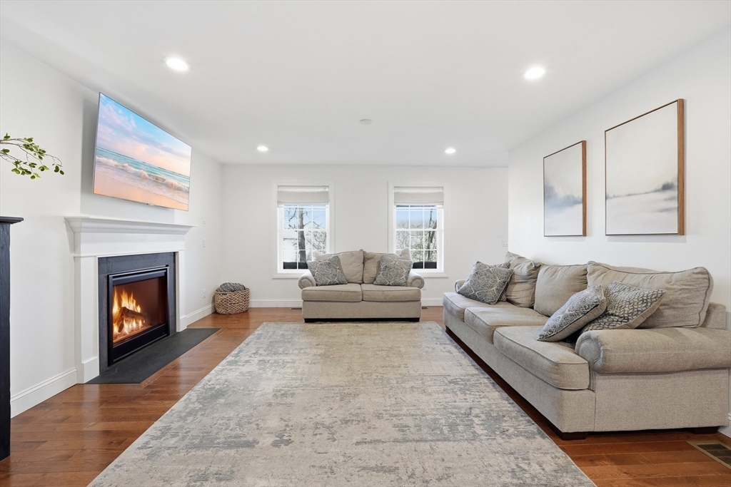 103 Rice Corner Road Brookfield, MA 01506 - Photo 13 of 39 a living room with furniture and a fireplace