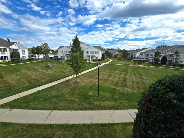 a view of a garden and basketball court