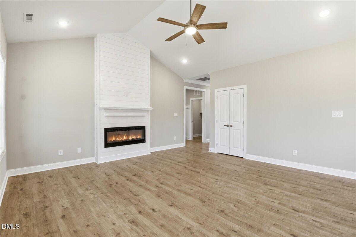 1345 Scarlet Oak Rd Spring Spring Hope, NC 27882 - Photo 11 of 23 a view of an empty room with a fireplace
