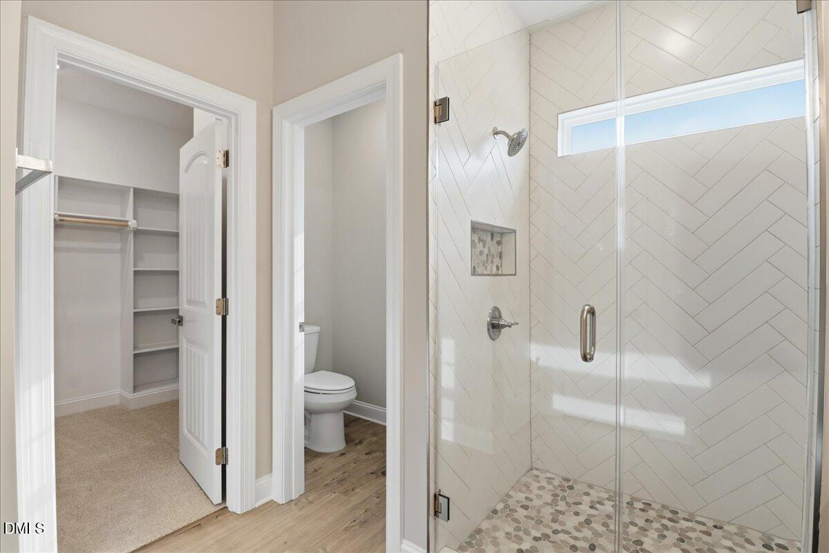 1345 Scarlet Oak Rd Spring Spring Hope, NC 27882 - Photo 15 of 23 a bathroom with a granite countertop shower and a toilet
