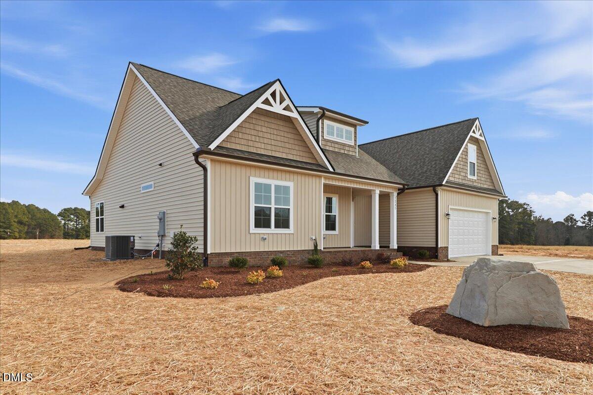 1345 Scarlet Oak Rd Spring Spring Hope, NC 27882 - Photo 2 of 23 a front view of a house with a yard