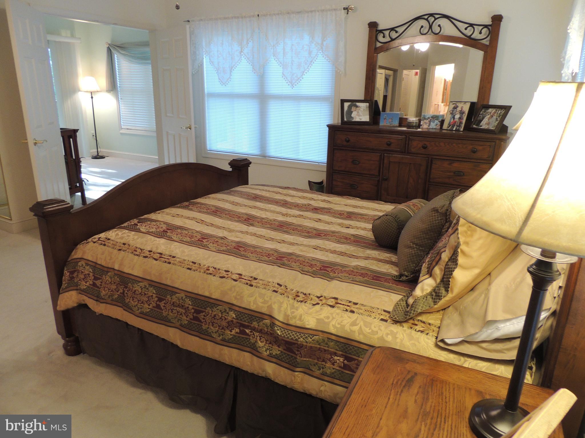 521 Runabout Loop Solomons, MD 20688 - Photo 12 of 33 Owners suite accesses den/office