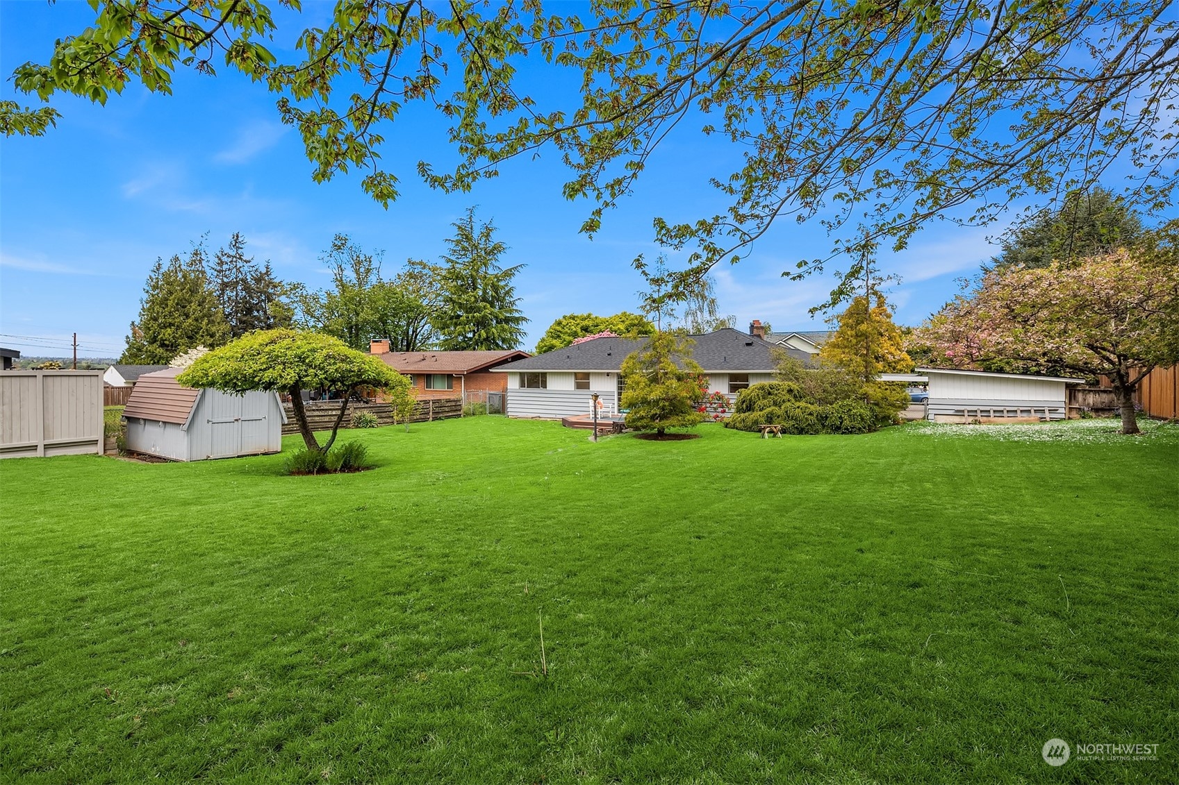 513 South 18th Street Renton, WA 98055 - Photo 30 of 31 a view of a house with a big yard
