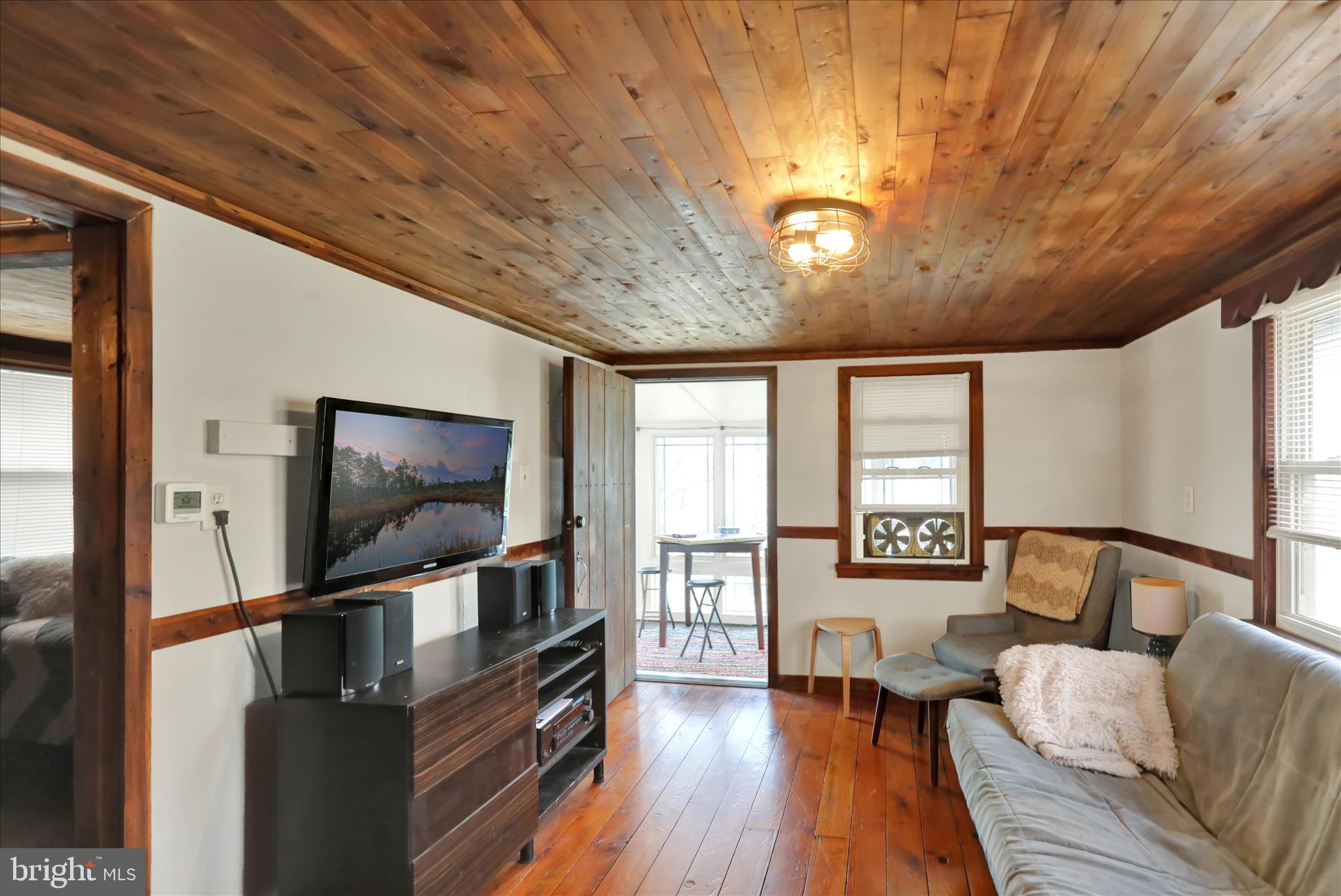 408 Circle Lane Peach Bottom, PA 17563 - Photo 11 of 27 a living room with furniture and a flat screen tv