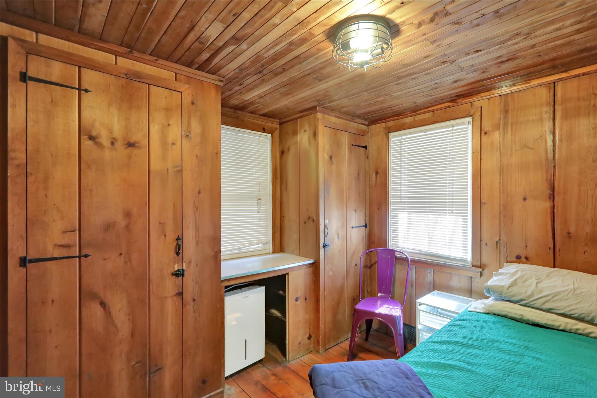 408 Circle Lane Peach Bottom, PA 17563 - Photo 14 of 27 a bedroom with furniture and a chandelier