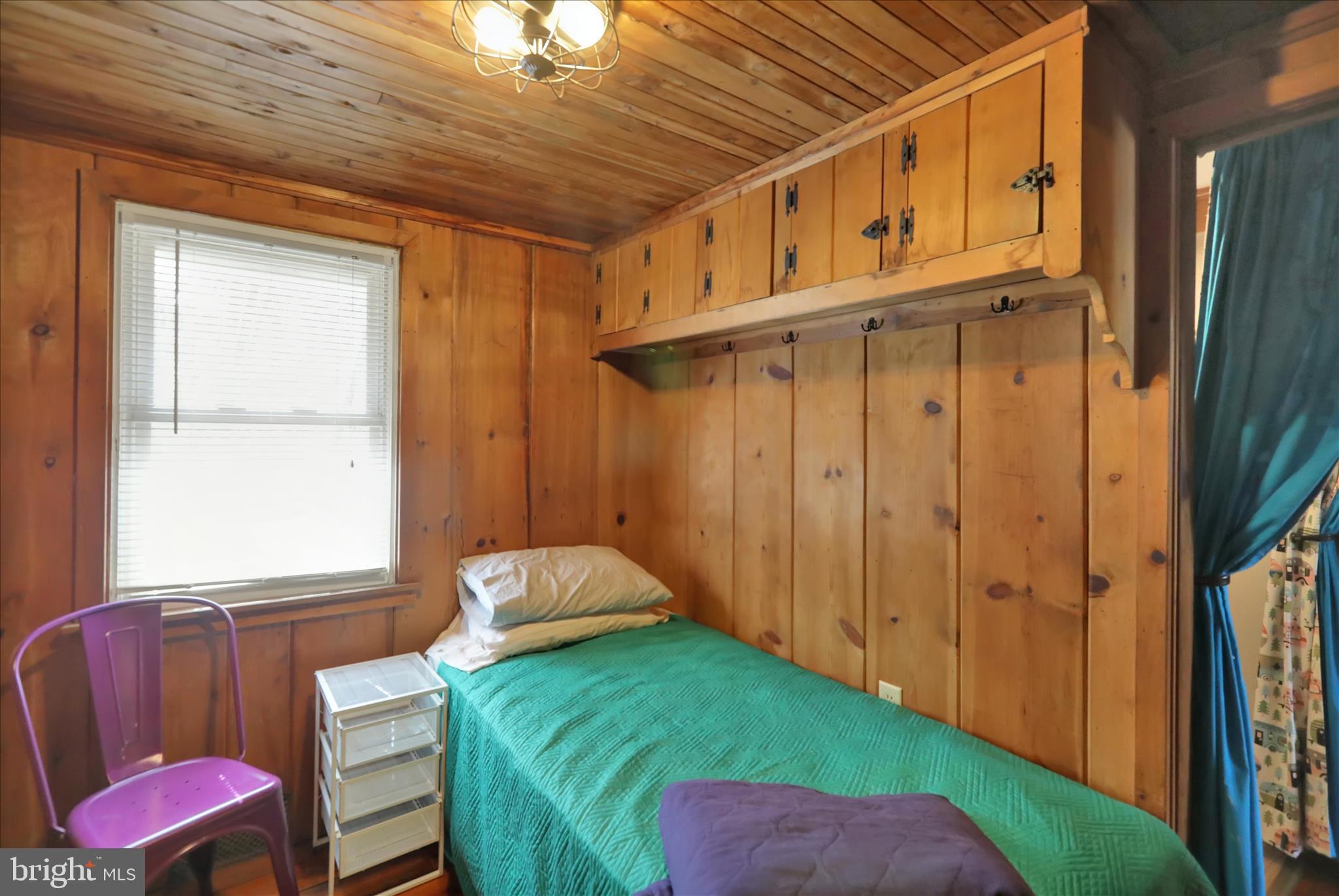 408 Circle Lane Peach Bottom, PA 17563 - Photo 15 of 27 a bedroom with a bed and a window