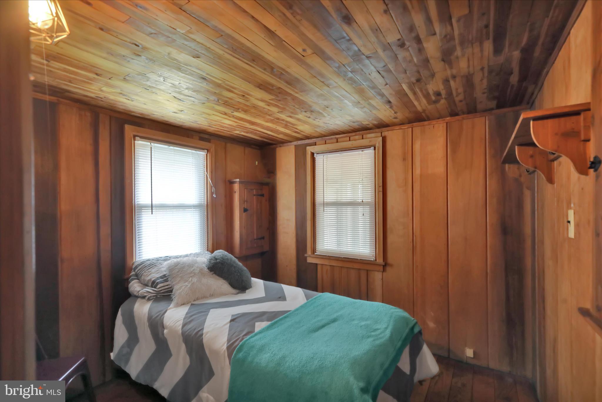 408 Circle Lane Peach Bottom, PA 17563 - Photo 19 of 27 a bedroom with a bed and a window