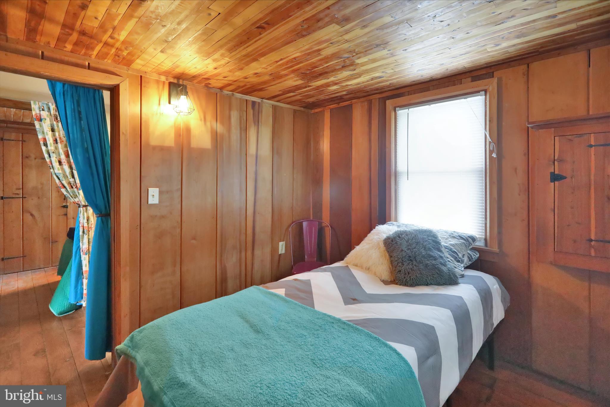 408 Circle Lane Peach Bottom, PA 17563 - Photo 20 of 27 a bedroom with a bed and a window
