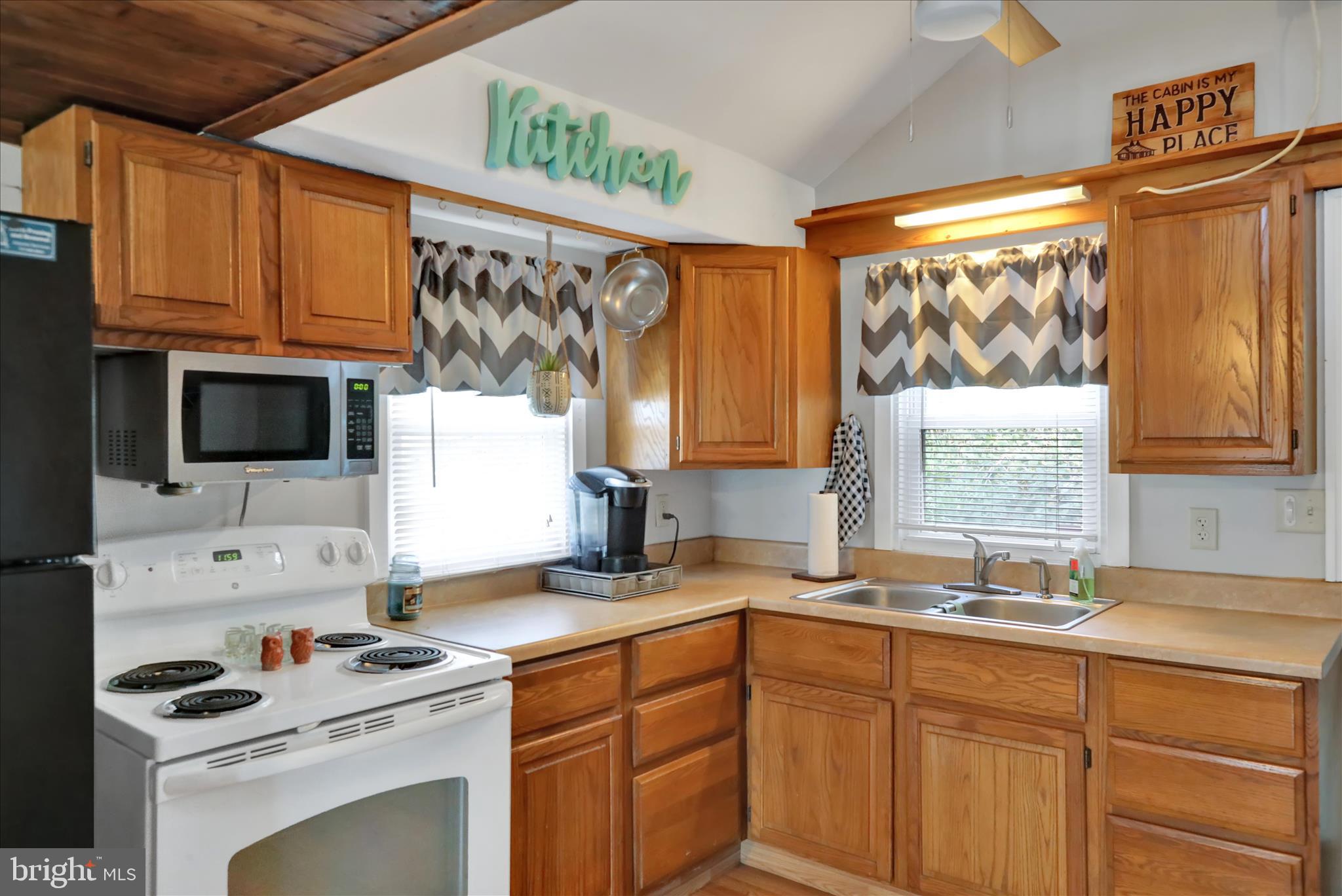 408 Circle Lane Peach Bottom, PA 17563 - Photo 9 of 27 a kitchen with a sink cabinets and window