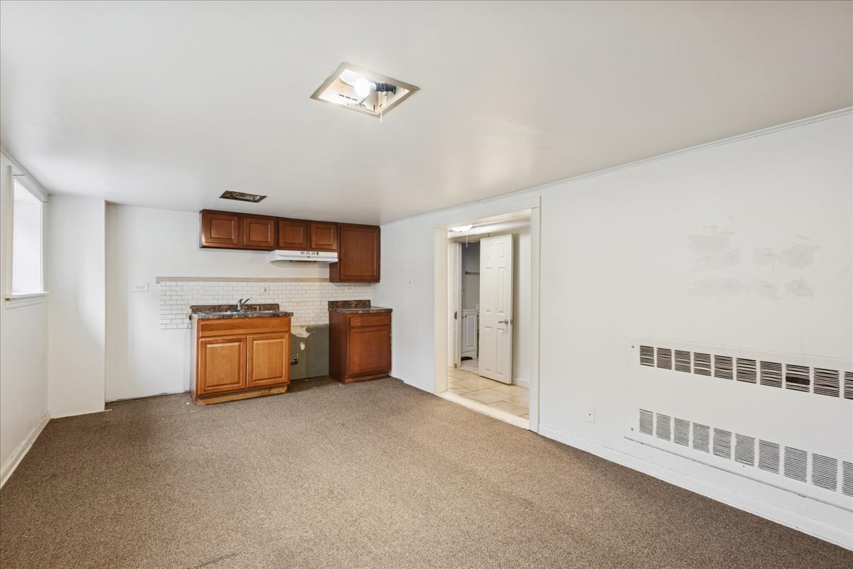 600 Ferdinand Avenue Forest Park, IL 60130 - Photo 16 of 20 a living room with furniture and a fireplace