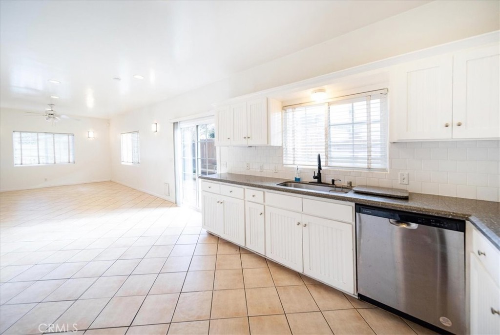 570 Emory Street Imperial Beach, CA 91932 - Photo 11 of 43 a kitchen with a sink cabinets and window