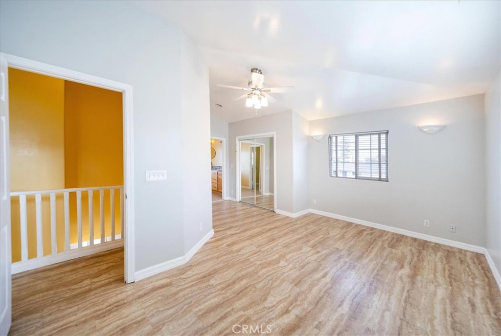 570 Emory Street Imperial Beach, CA 91932 - Photo 21 of 43 a view of an empty room with window and wooden floor