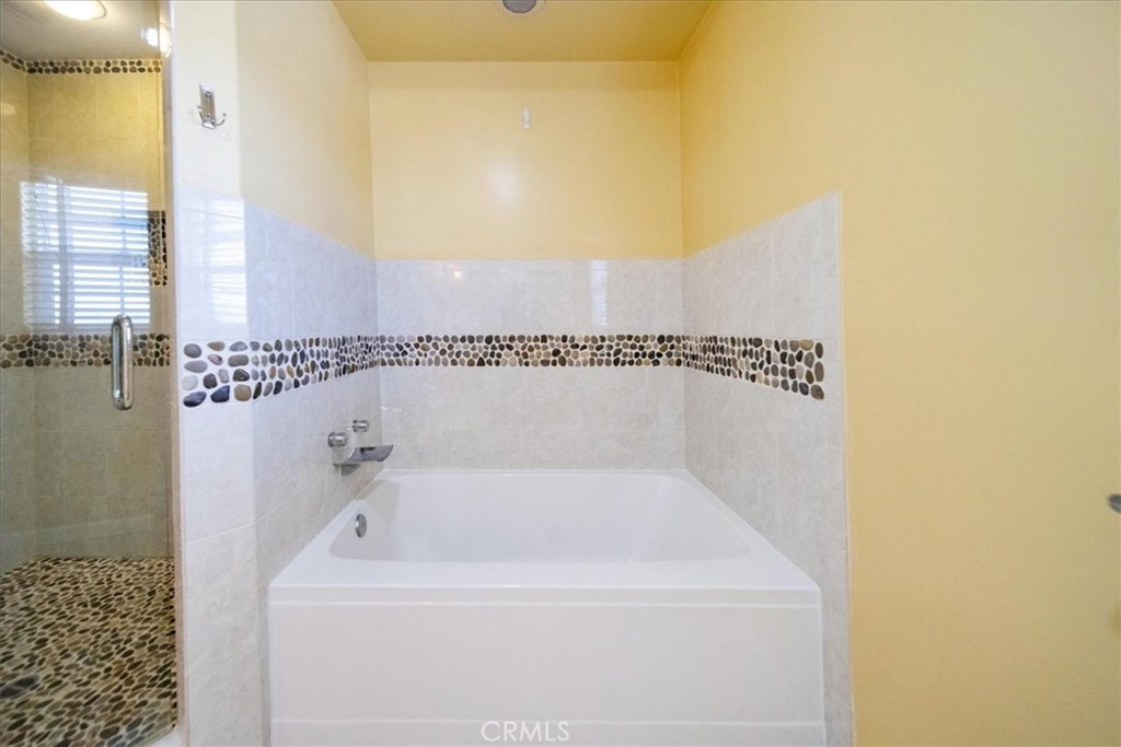 570 Emory Street Imperial Beach, CA 91932 - Photo 27 of 43 a bathroom with a bathtub