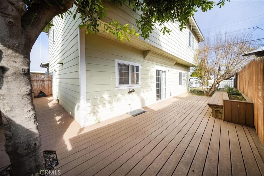 570 Emory Street Imperial Beach, CA 91932 - Photo 36 of 43 a view of backyard with a deck and wooden floor