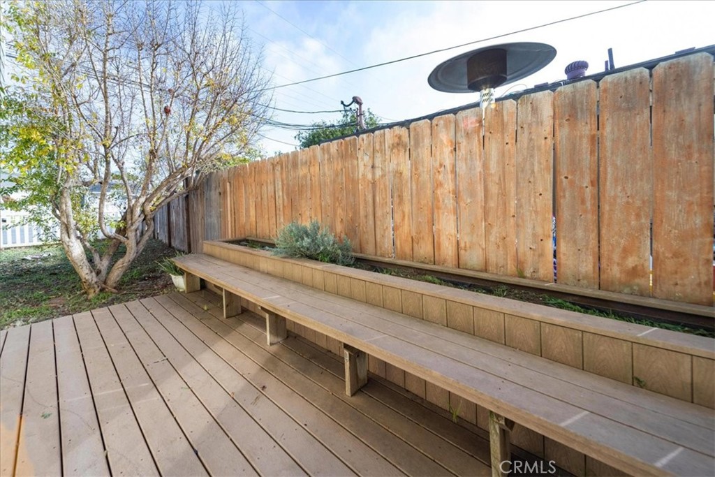 570 Emory Street Imperial Beach, CA 91932 - Photo 38 of 43 a backyard of a house with wooden floor and outdoor seating