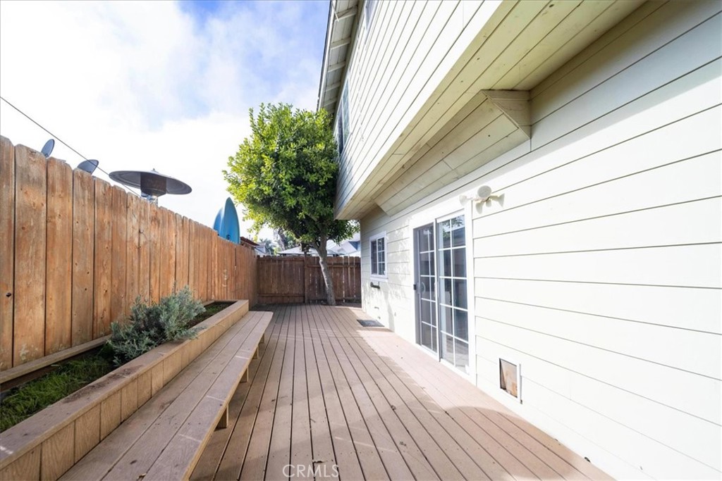 570 Emory Street Imperial Beach, CA 91932 - Photo 39 of 43 a balcony with wooden floor