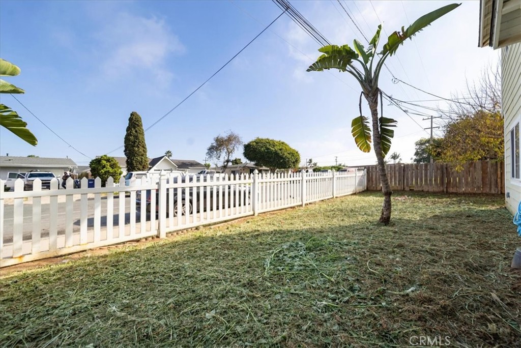 570 Emory Street Imperial Beach, CA 91932 - Photo 42 of 43 a view of a yard with wooden fence