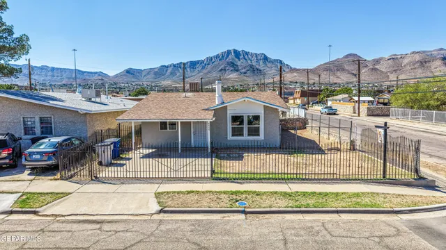 a view of a house with a swimming pool