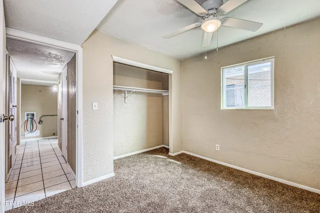 a kitchen with stainless steel appliances a sink and cabinets