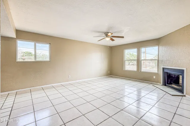 a view of an empty room and window