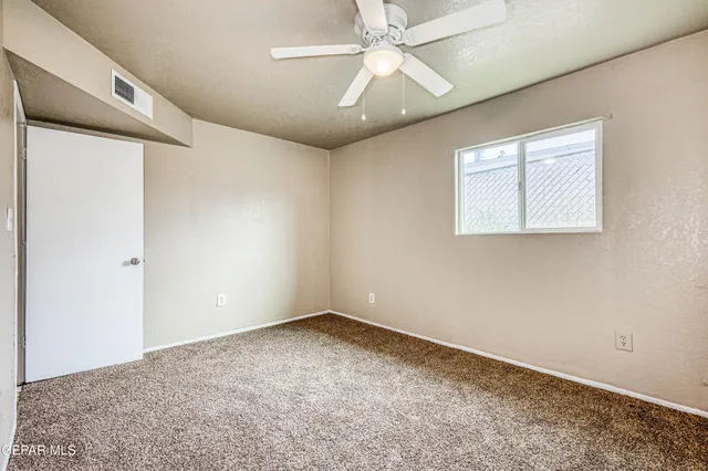 a view of roof deck with open kitchen
