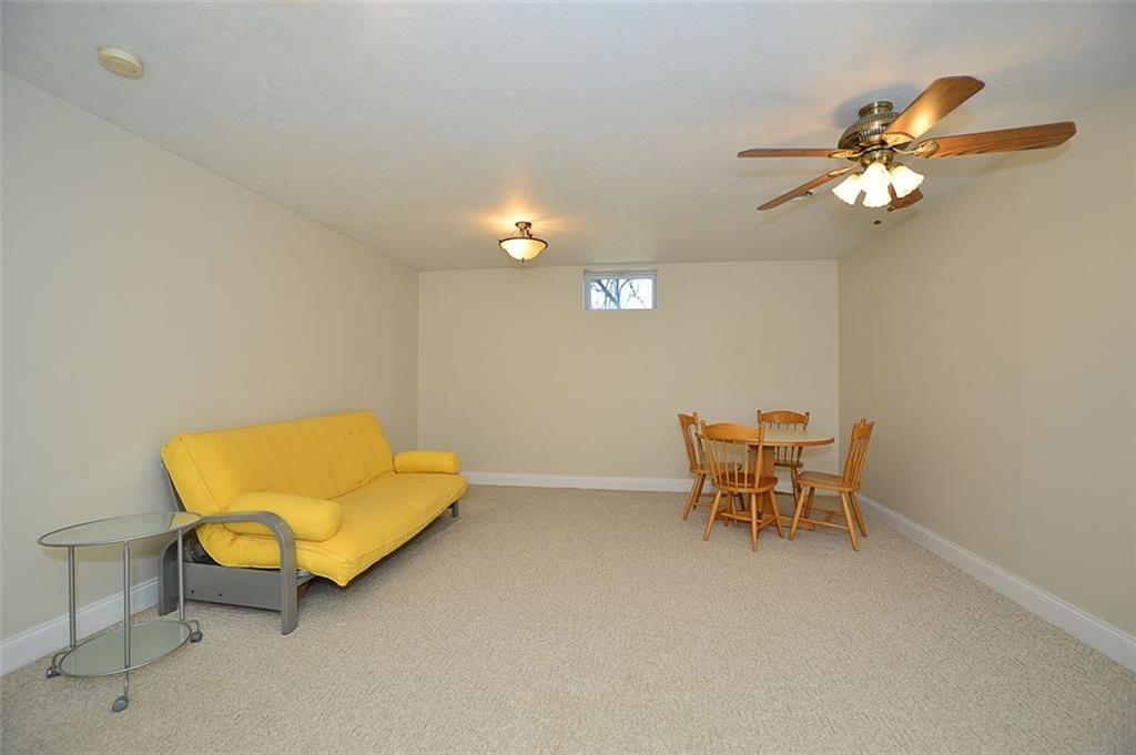 108 Cloverleaf Lane Butler, PA 16001 - Photo 21 of 25 This is the LOWER LEVEL Mother-In-Law Suite. Neutral tone carpet, new wall paint, and a MASSIVE closet. Also has access to a half bath.