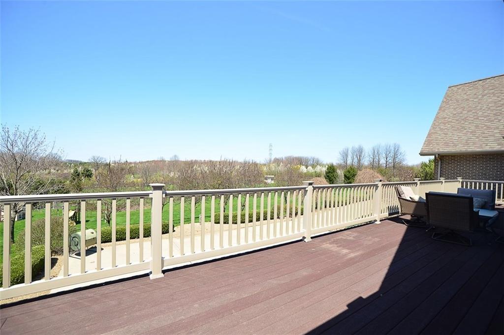 108 Cloverleaf Lane Butler, PA 16001 - Photo 5 of 25 MASSIVE elevated low-maintenance deck features breath-taking country views yet is easily accessed from the main floor of the home.