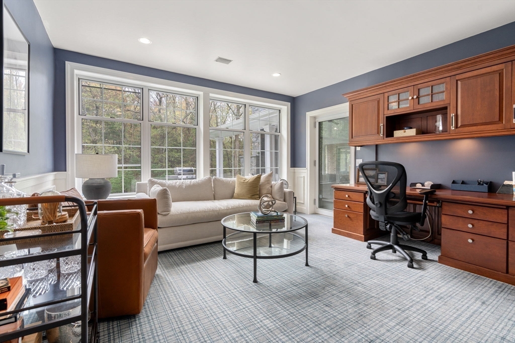 358 Cartwright Road Needham, MA 02492 - Photo 13 of 35 a view of a livingroom with workspace and a window