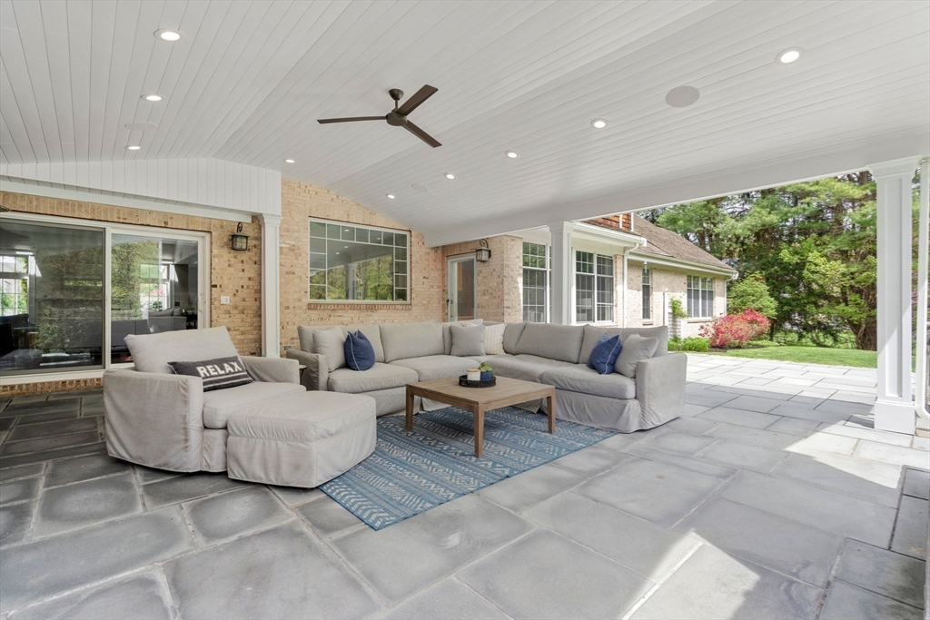 358 Cartwright Road Needham, MA 02492 - Photo 14 of 35 a living room with furniture and a large window