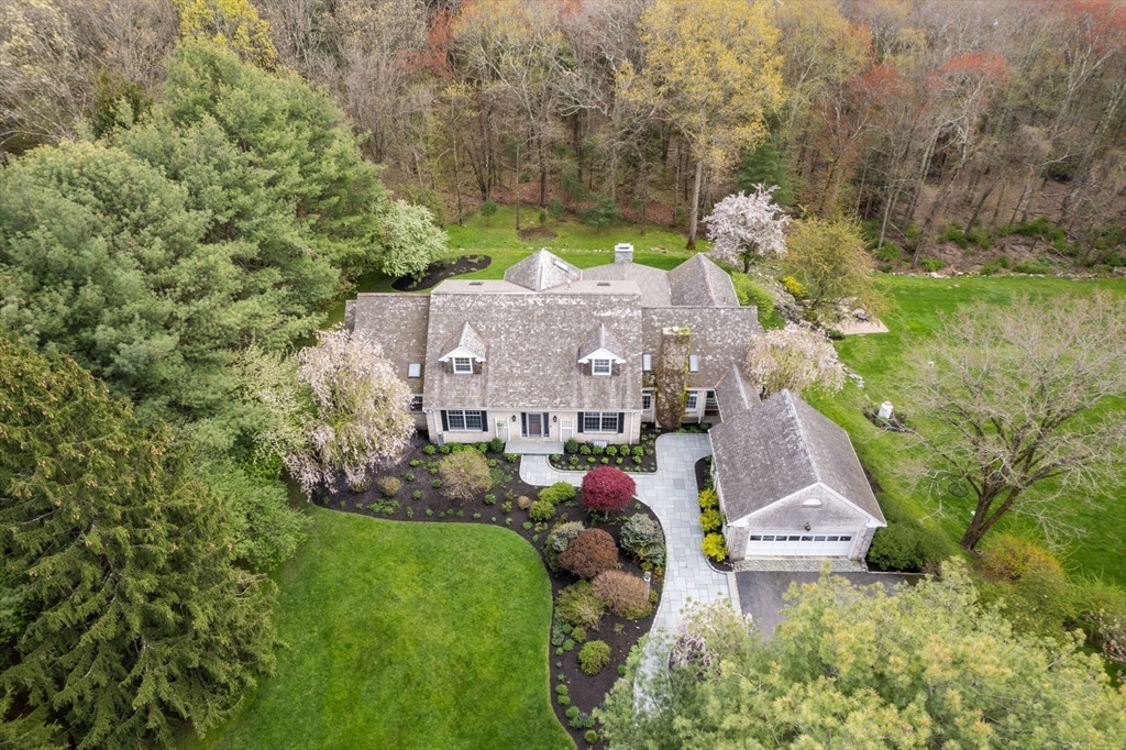 358 Cartwright Road Needham, MA 02492 - Photo 2 of 35 an aerial view of a house with a yard and lake view