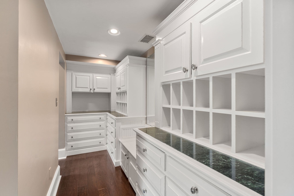 358 Cartwright Road Needham, MA 02492 - Photo 22 of 35 a kitchen with a cabinets and a stove