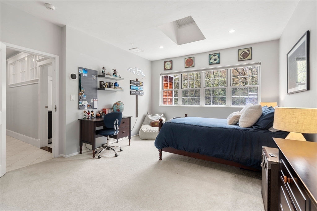 358 Cartwright Road Needham, MA 02492 - Photo 27 of 35 a bedroom with furniture and a window