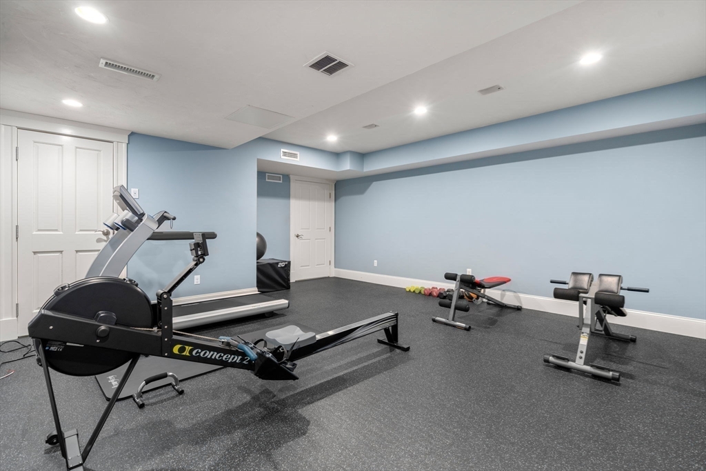 358 Cartwright Road Needham, MA 02492 - Photo 30 of 35 a room with gym equipment