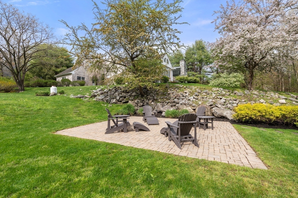 358 Cartwright Road Needham, MA 02492 - Photo 31 of 35 a view of a backyard with sitting area