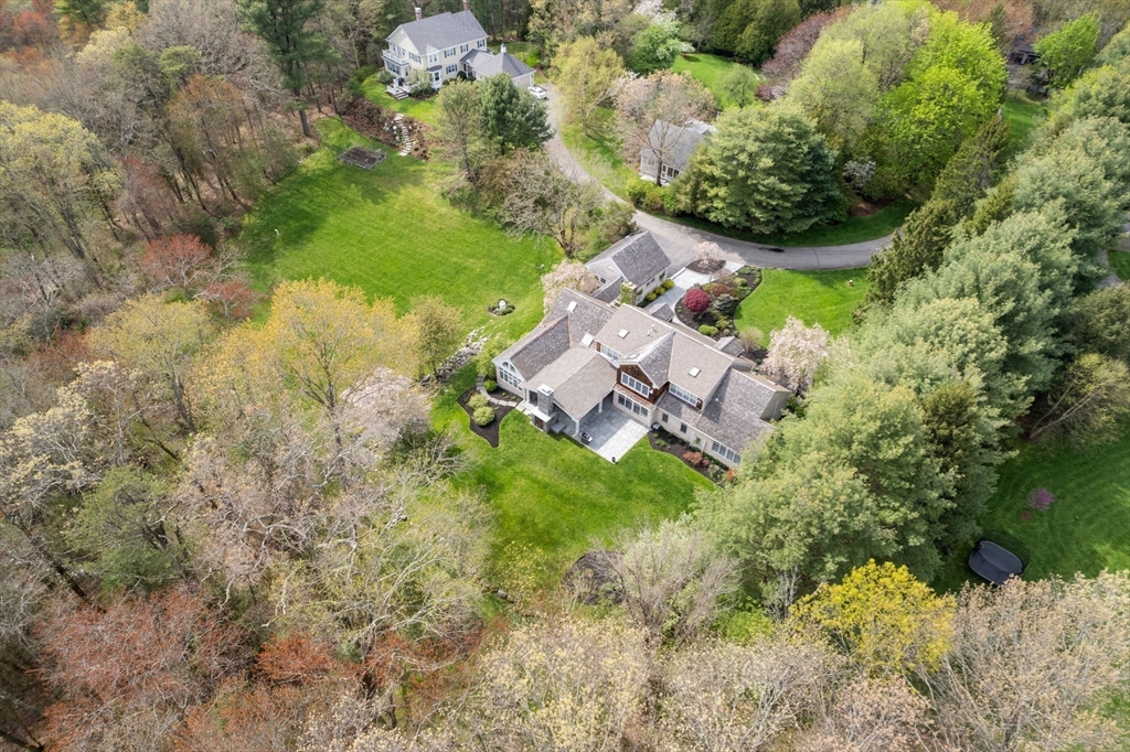 358 Cartwright Road Needham, MA 02492 - Photo 34 of 35 an aerial view of a house with a yard