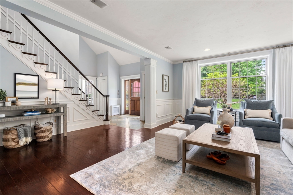 358 Cartwright Road Needham, MA 02492 - Photo 5 of 35 a living room with furniture and a table